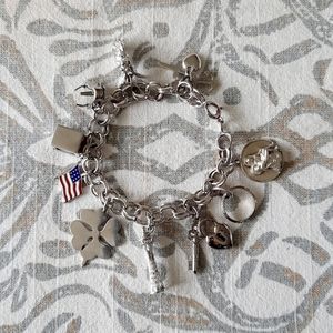 925 Sterling Silver Charm Bracelet with 10 charms - 7 inches